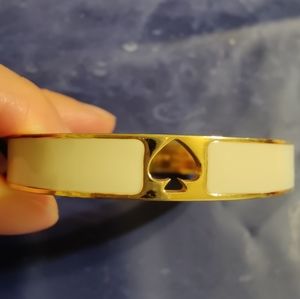 Kate Spade white and gold enameled bangle bracelet